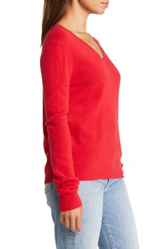 Stay warm in this luxuriously soft cashmere sweater fashioned in a relaxed, easy-to-layer fit. V-neck Long sleeves 100% cashmere Dry clean Imported Casual Cashmere V-neck Sweater, Red Cashmere Sweater With Fine Knit, Classic Red V-neck Sweater For Fall, Casual Cashmere V-neck Sweater For Layering, Red Cashmere Sweater For Fall, Casual Cashmere V-neck Sweater For Winter, Red Cashmere Winter Top, Long Sleeve Cashmere Soft Knit V-neck Sweater, Long Sleeve Cashmere V-neck Sweater