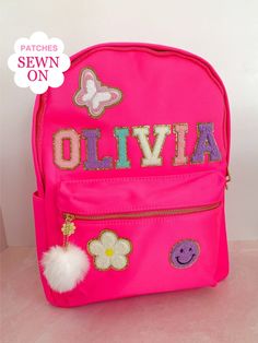 Welcome to Noa Jayne Co where we specialize in personalized backpacks for kids and toddlers! All backpacks are fully customizable and come with sewn on patches to ensure long lasting durability. Our backpacks are perfect for daycare, school, traveling, and make for the cutest diaper bag. The perfect personalized gift for kids!  *Pencil pouch purchased separately* Backpack *Fits children who are 43" - 49" tall *Overall: 12" wide x 5.3" deep x 15" tall (size small) *All gold hardware and zippers * Customizable Cute Backpack For School Events, Customizable Pink Backpack For Students, Personalized Pink Backpack For Back To School, Customizable Pink Backpack For School Events, Customizable Standard Backpack For School, Cute Customizable Standard Backpack, Cute Standard Backpack Customizable, Customizable Backpack For Back To School, Customizable Softback Backpack For Back To School