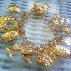 $10 Off Any First Poshmark Purchase From Any Seller - Use My Code @Hadiqabooks To Create Free Account And Redeem $10! Vintage Spring Easter 2 Item Bundle Designer Lillian Vernon Children's Charm Bracelet Size Xs - Small For Little Girl Boy I Received This As A Gift In My Childhood - Probably The Early 1990s I Remember The Red Velvet Bag It Came In With Gold Lettering - (Not Incld But If I Can Find It I Will Of Course Send!) Collectible And Nice Quality 1) Bracelet Gold Tone Gilded Charms Etched Charm Bracelet Gold, Spring Bracelet, Kids Accessories Jewelry, Gold Lettering, Gold Charm Bracelet, Vintage Spring, Funky Jewelry, Spring Easter, Vintage Butterfly