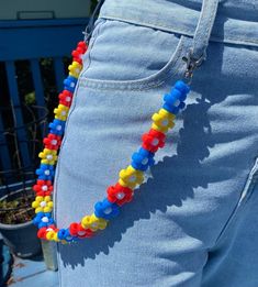 Primary Colors Kandi  Belt Chain! Good for aesthetics kidcore, clowncore, and so much more! Comes in two variations: - 24 flowers long  - 30 flowers long Flower Belt Chain, Kandi Belt, Cowboy Clown, Kandi Flower, Clowncore Aesthetic, Diy Kandi Bracelets, Silly Clothes, Diy Kandi, Kidcore Aesthetic