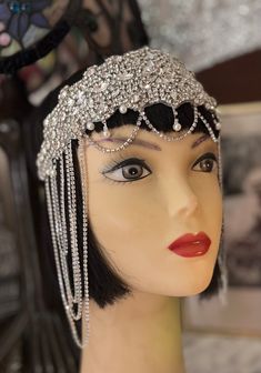 "Gorgeous Great Gatsby Pearl and Chain  headpiece.  Done with a solid Crystal Applique with Crystal and, Pearl Droplets going across the forehand  and, crystal sides in the form of loops. All attached to a stretch to fit band in Black. This is \"LIBERTY\"    Ladies are returning to a time of Elegance and, Glamour! The Old Hollywood Style Always Glamorous in the past and, now more then ever. . Gorgeous piece! Very Art Deco! Very Gatsby! THIS ONE IS A SHOWSTOPPER! HIGH-END STATUS! Stunning for a W Flapper Inspired Dress, 1950’s Dress, Silver Headpiece, Great Gatsby Headpiece, Gatsby Gala, Gatsby Headpiece, Costume Inspirations, Bar Mitzva, Chain Headband