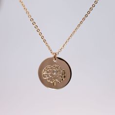 Celebrate their birthday with this dazzling Diamond Birth Flower Necklace. Each necklace features a stunning diamond and a unique birth flower charm, making it a perfect personalized gift. Show them how much you care (and know them) with this gorgeous and meaningful piece. Materials: 14k Gold Fill | 14k Rose Gold Fill | Sterling Silver Measurements: 16" chain, 18" chain Pendant: 5/8" coin Elegant Birthstone Medallion Charm Necklace, Elegant Medallion Charm Necklace With Birthstone, Elegant Birth Flower Jewelry For Anniversary, Elegant Gold Birthstone Necklace With Birth Flower, Diamond Necklace With Flower Charm For Anniversary, Elegant Round Charm Necklace For Mom, Elegant Round Charm Necklace As Gift For Mom, Elegant Charm Necklace As Gift For Mom, Elegant Charm Necklace Gift For Mom