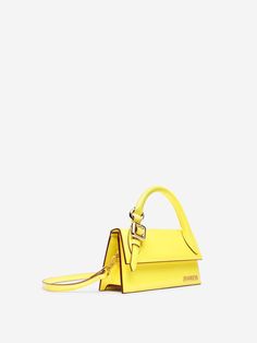 Bag by Jacquemus; Bandolera; Shoulder and handbag; Shiny spazzolato smooth leather; Reinforced handle with gold-plated buckle and ring; Metal logo on the front; Magnetic frame closure; Interior compartment; One interior pocket; Lined interior; Gold metal hardwareMade in ItaliaMeasurements: 21.5 x 18.5 x 5 cm100% LeatherGender: WomenMaterial: 100% LEATHERColor: METAL LOGO ON THE FRONTMade in: ITProduct ID: 23H233BA326-3128_250*Import tax/duty will be calculated at checkout (If applicable) Le Chiquito Long, Le Chiquito Moyen, Jacquemus Le Chiquito, Jacquemus Bag, Neon Bag, Medium Handbags, Leather Roll, How To Make Handbags, Bag Light