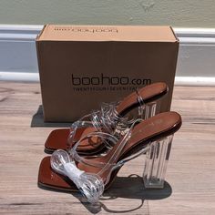 Nwot On Trend Clear Strappy High Heel Open Toe Sandals Ready For A Summer Wedding Or Date Night. Square See Through Heel Makes These Shoes Sexy Yet Comfortable. Square Toe With Patent Faux Leather Foot Bed. Size 10. Original Box, Never Worn, Only One Shoe Actually Tried On. Chic Sandals With Transparent Straps And Round Toe, Chic Sandals With Transparent Straps, Beach Sandals With Transparent Straps And Open Toe, Beach Sandals With Transparent Straps, Round Toe Sandals With Clear Strap For Night Out, Brown Sandals For Summer Night Out, Beach Heels With Clear Ankle Strap, Beach Heels With Ankle Strap And Clear Strap, Beach Heels With Clear Strap And Block Heel