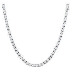 5 Carats of round diamond set on a shared prong setting in 14k white gold to create a timeless necklace. Metal: 14k Gold Diamond Cut: Round Total Approx. Diamond Carats: 5ct Diamond Clarity: VS Diamond Color: F-G Size: 22 Color: White Gold Included with your order: Certificate of Appraisal Customized Necklace Box & Bag Free Overnight Shipping Customized Necklace, Diamond Tennis Necklace, Round Diamond Setting, Vs Diamond, Expensive Jewelry, Tennis Necklace, Necklace Box, Diamond Set, Drop Necklace