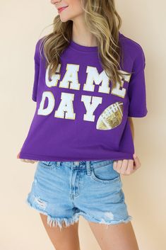 Show off your game day spirit with our IT'S GAME DAY FOOTBALL TOP! This playful tee features game day patch letters and a sparkling sequin football for added flair. With its comfortable fit and short sleeves, you'll be ready to cheer on your team in style! Grab this beauty for your upcoming games! Game day patch tee Sequin football Short sleeve Round neckline Runs true to size, comfortable Fit Cheer on your favorite teams with this top! Patch Letters, Football Top, Game Day Football, Football Tops, It Game, Peach Love, Vintage Havana, Dress Jewelry, Red Garnet