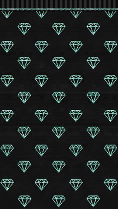 a black background with green diamonds on it