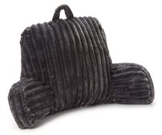 a black purse with pleated fabric on the front and back sides, sitting upright