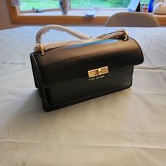 Brand New With Tags. This Bag Is 100% Authentic And Includes Authenticity Tags. Never Used, With Original Protective Foam. Can Wear As A Crossbody Or Overlap The Strap As A Shoulder Bag. Cannot Find Anywhere Else. Exclusive. 100% Cow Split Leather Approx. 4.5"H X 3.5"D X 9"L Designer Black Baguette Bag For Travel, Black Shoulder Flap Bag With Dust Bag, Designer Black Square Flap Bag, Designer Black Baguette Bag For Daily Use, Black Flap Bag With Dust Bag For Travel, Black Flap Bag For Travel With Dust Bag, Black Designer Satchel Baguette Bag, Black Satchel Flap Bag With Dust Bag, Black Flap Satchel Bag With Dust Bag