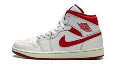 The Air Jordan 1 Mid SE “Dune Red” is a colorway of the casual mid-top shoe with red details.  As classic a look as any for the popular Jordan 1 Mid model, the “Dune Red” features a white leather upper with Dune Red Swoosh branding on either side, and Dune Red “Wings” detailing on the collar.  The deep red hue also appears on the collar underlay, as well as on the Jumpman and “Air” branding on the Sail-colored tongue tag.  Underfoot, a Sail rubber midsole and a red rubber outsole complete the de Mid Top Shoes, Red Jordans, Air Jordan 1 Mid Se, Red Details, January 20, Mid Top, Air Jordan 1 Mid, Jordan 1 Mid, Red Wings