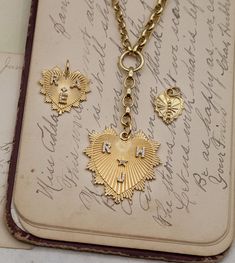 18K Yellow Gold Custom Radiating Heart : Medium Medallion – FoundRae Pragma Love, Radiating Heart, Playful Love, Diamond Letters, Block Letters, Gold Medallion, Love Token, Vintage Jewels, Heart Love