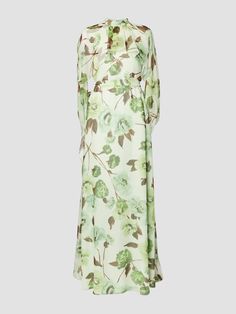 Cut from lightweight pistachio-hued silk voile, this gown beautifully showcases the season’s painterly Violetta Bloom floral. Its elegant silhouette is framed by a stand collar, cleverly draped cape overlay, and floor-length hem. This floor-length gown has a stand collar, cape overlay, long sleeves, and a belt. It has a centre back invisible zip fastening and is lined at the bodice and skirt in pistachio silk crepe de chine. Fits true to size. Model is 5'10" and wears a size UK 6. 100% Silk. Lining: 100% Silk. Do Not Machine Wash. Delicate Dry Clean. Do Not Bleach. Do Not Tumble Dry. Cool Iron on Reverse. Pre-draped Silk Chiffon Maxi Dress For Spring, Green Gown For Spring Garden Party, Elegant Green Gown For Garden Party, Spring Pre-draped Maxi Gown, Green Floral Print Gown, Elegant Green Gown For Spring, Spring Pre-draped Silk Chiffon Maxi Dress, Chic Silk Chiffon Maxi Dress For Garden Party, Green Silk Chiffon Dress For Spring