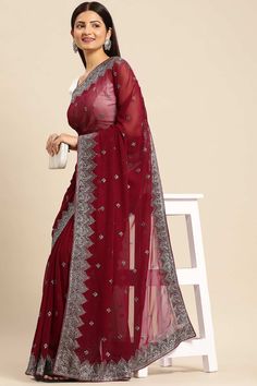 Product Features: Color: Wine Fabric: Pure Georgette Blouse Fabric: Pure Georgette Pattern: Embroidered Print Or Pattern: Floral Wash: Dry Clean Occasion: Party,Festive Product Type: sarees Disclaimer: There will be slight difference in digital to actual image Bollywood Style Embroidered Pre-draped Saree For Party, Floor-length Embroidered Fabric For Diwali Party, Embroidered Pre-draped Saree For Eid Party, Festive Embroidered Georgette Blouse Piece, Embroidered Georgette Pre-draped Saree For Party, Floor-length Zari Embroidered Fabric For Party, Fitted Embroidered Georgette Fabric For Celebration, Floor-length Embroidered Fabric For Eid Party, Party Embroidered Pre-draped Saree In Chinon