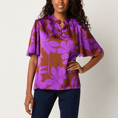 This Liz Claiborne women's blouse features a vibrant print and soft satin texture that you'll love. This floral-print style features elbow-length flutter sleeves and a banded button-up neckline. Balance the silhouette with slim-fit pants and pumps. Closure Type: Button, Pullover HeadFit: Regular FitNeckline: Collar NeckSleeve Length: Elbow SleeveSleeve Style: Flutter SleeveApparel Length: 26 InchesFiber Content: 100% PolyesterFabric Description: SatinCollar: Banded CollarCare: Machine Wash, Tumb Satin Texture, Large Shirts, Satin Blouse, Print Style, Elbow Sleeve, Slim Fit Pants, Flutter Sleeves, Shop Blouses, Short Sleeve Blouse