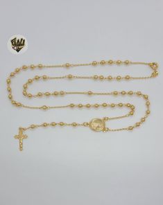 Description: -Guadalupe Virgin Rosary Necklace. -Material: 18k Gold Overlay (BGO). -Width: 1mm. -Beads: 3.5mm. -Available in Size: 23.5". Brazilian Gold, Rosary Necklace, Gold Overlay, Rosary, Arrow Necklace, Chain Necklace, 18k Gold, Collar, Beads