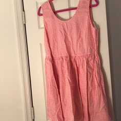 Nwt Adorable Pink Gingham Dress, Cute Bow Detail On Back! This Dress Has Pockets (Pocket On R Side Sewn Partially Shut, Was Like That When I Bought It And Haven’t Attempted To Cut The Stitching) Smoke Free, Pet Free Home Casual V-neck Sundress With Pockets, Cotton A-line Dress With Side Pockets, Spring Sundress With Pockets For Summer, Summer Sundress With Pockets For Spring, Summer Dresses With Pockets For Day Out, Spring Preppy Knee-length Dress, Sundress With Pockets For Day Out, Spring Sleeveless Sundress With Pockets, Spring Sundress With Pockets