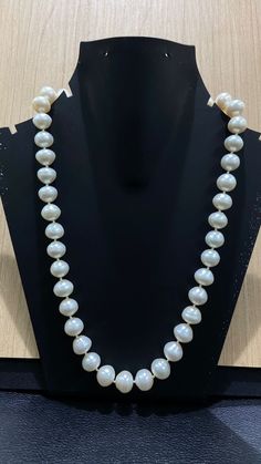 Big Size Round Pearl Necklace - Freshwater Pearl Beads - Minimal Peral Necklace - Bridesmaid Gift   Shape : Round Pearl Beads  Type    : Freshwater Pearl  Color   : White  Weight : 68.88 gram approx  Beads : 40-45 Beads About Pearls -  As we now know, freshwater pearls form in lakes, rivers, and other non-salted water. Over 90% of freshwater pearls are known as baroque pearls. This means they have an irregular shape, the most abundant type. This irregular shape is what makes them so beautifully Classic Polished Pearl Necklace For Wedding, Classic Wedding Pearl Necklace With Polished Beads, Classic Polished Beaded Necklaces For Wedding, Single Strand Pearl Bridal Necklace With Round Beads, Classic Wedding Beaded Necklace With Polished Beads, Pearl Bridal Necklace With Single Strand Of Round Beads, White Polished Pearl Necklace For Formal Occasions, Large Bead Pearl Necklace For Wedding, Elegant Large Bead Pearl White Necklace