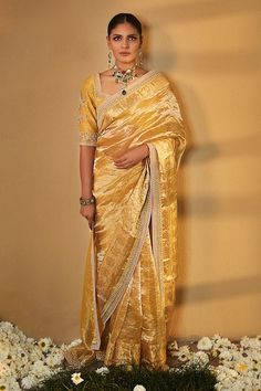 Buy Yellow Saree Tissue Blouse Chanderi Silk Sunaina Wrinkled With For Women by MATSYA Online at Aza Fashions. Gold Pre-draped Saree For Reception, Transitional Gold Pre-draped Saree With Gota Work, Gold Cotton Silk Pre-draped Saree For Reception, Elegant Yellow Saree For Transitional Season, Yellow Pre-draped Saree For Transitional Wedding Season, Elegant Festive Slub Silk Pre-draped Saree, Elegant Silk Sharara With Zari Weaving, Wedding Saree In Silk With Gota Work, Elegant Silk Saree With Gota Work