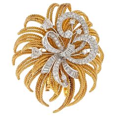 We boast a wide collection of brooches, especially brooches by David Webb. This one caught our eye due to it's size, elegant shape and for it's combination of materials and various diamonds. Wearable and versatile we love brooches that look vintage yet very modern. The gold curls are created in a twist like solid shape which complements the open work spray of diamonds in the Measurements: 63mm x 53mm. Diamonds Weight: 8.00cttw Diamond Shapes; Round, Baguette, Heart Diamond Flower Brooch, Big Diamonds, Solid Shapes, David Webb, Yellow Jewelry, Diamond Birthstone, Big Diamond, Shine Bright Like A Diamond, Elizabeth Taylor