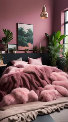 a bed covered in pink fur next to a window with potted plants on it