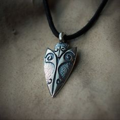 Thank you for visiting my Argent Aqua Etsy shop, which is filled with lovely, affordable wildlife jewellery. To see my more valuable work please visit www.adrianashley.com This piece is also available in gold or platinum. Please message me for details. Made in the United Kingdom. Arrowhead necklace, sterling silver arrowhead pendant, ancient Celtic design.  Oxidised silver Arrowhead pendant decorated with the same La Tène style ancient Celtic designs that are sometimes encountered by Archaeologists and featured in the design of the pre-roman Battersea Shield. The La Tene style is the name given to elite art and artefacts created by part of the ancient culture known to us as the Celts. It developed and flourished during the Iron Age of pre-Roman Europe around 2500 to 2000 years ago. This pe Arrowhead Jewelry, Arrowheads Jewelry, Arrowhead Necklace, Celtic Design, Jewelry Tattoo, Dragon Pendant, Celtic Designs, Oxidized Silver, Silver Pieces