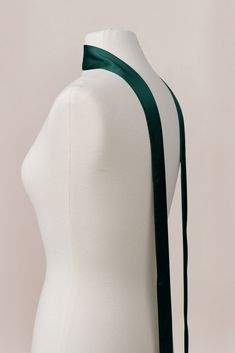 A chic accessory to dress up your bridal party or to glam up your wedding day look, this scarf can transition to any special occasion you are attending! Measures 86" in length and 2" in width. Wedding Sash With Tie Back, Formal Satin Scarves, Elegant Fitted Green Sashes, Elegant Tie Back Sashes For Formal Occasion, Elegant Tie Back Sash For Formal Occasions, Elegant Formal Sash With Tie Back, Elegant Formal Sash With Satin Finish, Elegant Green Scarves For Party, Elegant Green Scarf For Formal Occasions