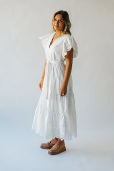 Get ready to turn heads in the Cresswell Eyelet Detail Dress! This stunning off-white dress features eyelet detailing and a figure-flattering silhouette, perfect for any occasion. With its playful design and unique features, this dress is sure to make a statement wherever you go. Be the talk of the town in the Cresswell Eyelet Detail Dress! Details self: 100% cotton lining: 100% rayon Fabric Care Guide Here Sizing & Fit Measurements are approximate and taken while laying flat across the front. N Drop Shoulder Cardigan, Off White Dresses, Talk Of The Town, Nursing Friendly, The Talk, Unique Features, Jeans Jumpsuit, Rayon Fabric, Cardigan Jacket