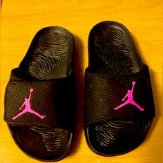 New Air Jordan Slides! Black & Pink! Toddler Size 11c. Sorry No Box. Make An Offer! Jordan Sandals Slipers, Jordan Slides, Fade-resistant Black Slides, Black Slip-resistant Sports Slides, Adjustable Black Slip-on Slides, Black Adjustable Non-slip Slides, Jordan Black, Kids Jordans, Sandals Flip Flops