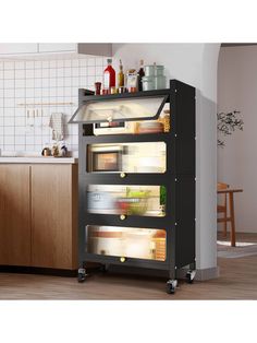 an open refrigerator sitting in the middle of a kitchen