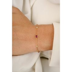 This is part of Chairish’s Fine Jewelry assortment.  This Minimal Natural Ruby Diamond Chain Bracelet in 18K gold showcases 0.32 carats endlessly sparkling natural ruby and 0.05 carats of diamond. It measures 7 inches long in length.  Ruby improves mental strength. Designed with oval cut ruby and diamond set in bezel settings to make you stand out on any occasion or event. The elegant style complements the attire beautifully and is a perfect Engagement Gift, Bridal Shower Gift, Gift For Love, Gi Elegant Red Bracelet With Birthstone, Elegant Red Birthstone Bracelet, Yellow Gold Ruby Diamond Jubilee Bracelet, Elegant Red Chain Bracelet With Jubilee Design, Yellow Gold Diamond Bracelet With Gemstone, Elegant Red Jubilee Chain Bracelet, Ruby Diamond Bracelet In Jubilee Style, Ruby Diamond Bracelet With Jubilee Style, Elegant Yellow Gold Chain Bracelet With Gemstone