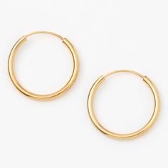 Keep it simple with an everyday pair of gold plated hoops! This pair of hoop earrings are the perfect size to dress up or down. Finish: 18kt gold plated Diameter: 14MM Closure: Endless loop Material: Metal - Claire's 18kt Gold Plated 14MM Hoop Earrings Fashionable Jewelry, Jewelry And Accessories, Keep It Simple, Gold Bracelet, Gold Plate, Bangles, Fashion Jewelry, Hoop Earrings, Dress Up