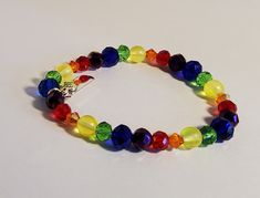 Beautiful Pride Bracelet  Inspirational Charm. Made with stretch wire for comfort and durability. Aurora Colorado, Pride Bracelet, Chakra Beads, Circle Pendant Necklace, Rainbow Beads, Faceted Crystal, Circle Pendant, Agate Stone, Faceted Bead