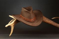 This is a cowboy leather hat, that is made in my workshop and is completely handmade. Main material is dark brown 3-4 oz (1.5mm) thick leather that is sewed together with brown waxed thread. All sizes are available, just measure your head circumference little bit above your ears, and let me know it. Rodeo Hat, Brown Cowboy Hat, Leather Hat, Hat Handmade, Leather Hats, Quality Hats, Handmade Hat, Cowboy Hat, Head Circumference