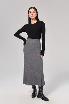 Sophisticated A-line Skirt: Resilient Washable Wool-blend Mastery Our A-line skirt, knit from a blend of washable wool, captures elegance in its purest form. The mid-high waist design elongates the silhouette, while the soft and resilient fabric ensures comfort all day. Style #: WKAI207 Elegant Ribbed Maxi Skirt, Elegant Long Knit Skirt, Elegant Knit Relaxed Skirt, Elegant Relaxed Knit Skirt, Elegant Ribbed Midi Skirt, Elegant Ribbed Skirt, Elegant Ribbed Skirt For Workwear, Elegant Ribbed Skirt For Work, Winter Knit Relaxed Skirt