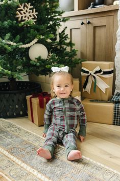 Wrap your little one in the timeless charm of our Green Plaid Bamboo Zipper, perfect for cozy days and nights. Made from soft and breathable bamboo fabric, this zipper sleeper ensures comfort for your baby in sizes ranging from 0-3 to 18 months. The classic green plaid design adds a festive touch, making it ideal for the holiday season and beyond. For a coordinated family look, matching pajamas are available for toddlers, kids, and adults, creating the perfect ensemble for memorable moments toge Family Look, Going Home Outfit, Swaddle Sets, Matching Pajamas, Changing Pad Cover, Baby Swaddle, Baby Socks, Bamboo Fabric, Plaid Design