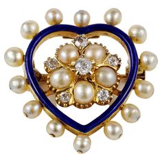 This sweet and rare heart pendant/ brooch is Victorian period, 1880 ca expressing the romanticism tradition of the Victorian era, crafted of solid 18 KT gold Set throughout with a combination of Diamonds, natural Pearls and gorgeous Royal Blue enamelling. Heart is presented in gorgeous Royal Blue framing a centre Flower of Pearls and Diamonds and more Pearls set on the outer edge Pearls are of special sheen being all natural not nucleated sea Pearls – approx .40 Ct of G VS Diamonds The back pin can screw off and allow the use as pendant or as a brooch by leaving the pin It comes with its original box It measures 25 mm. x 25 mm. Rare and so beautiful! Metal; 18 Kt yellow gold, tested Hallmarks: none/worn Gems: 14 natural pearls of 3.5 mm. in diameter each (average) – 5 natural pearls of 4.5 Royal Blue Heart, Edwardian Jewelry, Victorian Period, Heart Shaped Jewelry, Antique Brooches, Heart Brooch, Vs Diamond, Pearl Set, Natural Pearl