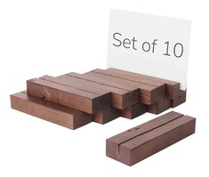 a set of ten wooden blocks with a sign on top that says set of 10