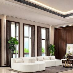 an elegant living room with white furniture and wood paneled walls, along with large windows