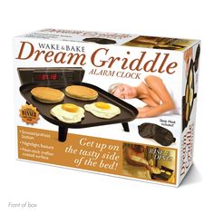 an electric griddle with three eggs on it and the words wake and bake