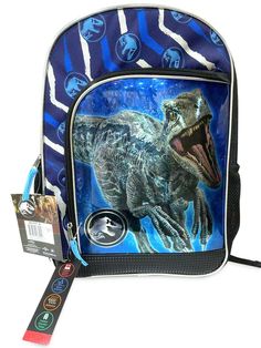 Jurassic World 17" Kids Backpack/Mochila Blue New Please message us if you have any questions. Returns: We accept returns within 30 days as long as all items are returned in the same condition they arrived in. Buyer to pay return shipping. Blue Raptor, New Jurassic World, World Sticker, Dinosaur Backpack, School Tote, Sticker Books, Personalized Backpack, T Rex Dinosaur, Bag School