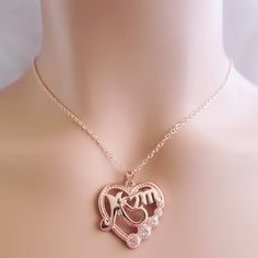 Beautiful Mom Rosegold Necklace Condition: New Material: Rosegold Length: 19in With 2.5in Extender Heart-shaped Rose Gold Charm Necklace, Rose Gold Metal Heart Pendant Jewelry, Elegant Rose Gold Necklace As Gift For Mom, Elegant Rose Gold Necklace For Mom, Elegant Metal Charm Necklaces For Mother's Day, Rose Gold Clavicle Chain For Valentine's Day, Elegant Metal Charm Necklace For Mother's Day, Valentine's Day Rose Gold Metal Jewelry, Rose Gold Metal Necklaces For Anniversary