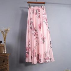 40930828025923|40930828091459 Feminine Flowy Floral Print Skirt, Pink Flowy Flared Maxi Skirt, Pink Chiffon Skirt With Lined Detail, Pink Chiffon Skirt With Lining, Pink Chiffon Lined Skirt, Bohemian Chiffon Maxi Skirt With Floral Print, Pink Floral Print Chiffon Skirt, Flowy Feminine Maxi Skirt With Floral Print, Feminine Flowy Maxi Skirt With Floral Print