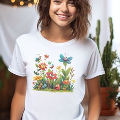 Mothers Day Gift for Mom Grandma Tshirt: Show Mom your love with our heartfelt designs that celebrate her strength, love, and unwavering grace. Shop now and give her a gift as unique and beautiful as she is! Made from our BELLA AND CANVAS brand, this tee offers style and comfort. Here's what you need to know before you make your purchase: 1.Unisex Adult Sized Shirts. They're not women's fitted shirts, so for a more fitted look, consider sizing down. 2.Rolled Sleeves in pictures are for styling purposes only. 3.Props used in photos are NOT included with purchase. PRINT DESIGN 1.This is a Direct-To-Garment printed item, ensuring durability without cracking or peeling. 2.The ink is printed INTO the fabric, ensuring longevity. WASHING INSTRUCTIONS 1.Wash inside out, in cold water, on a gentle Playful White Floral Print Top, Mother's Day Floral Print Crew Neck T-shirt, Cute Cartoon Print T-shirt For Mother's Day, Crew Neck Floral Print T-shirt For Mother's Day, Floral Print Crew Neck T-shirt For Mother's Day, Mother's Day Cartoon Print Short Sleeve T-shirt, Cute Cartoon Print Tops For Mother's Day, Short Sleeve Cartoon Print Top As Gift, Cute Floral Graphic Print Tops