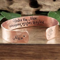 "Take a LOOK at our Website: ANNIEREH.com Personalized Mom Bracelet, Custom Mother's Cuff Bracelet, Secret Message Bracelet, Mothers Day Gift, Gift for Mom, Mother of the Bride Gift Customize our cuff bracelets with your favorite word/s, meaningful phrase, special saying, names of loved ones, grandchildren, dates and even coordinates for the place you met your partner or shared a special moment with someone. Let us know the Wording for this cuff in our personalization box at check out for the tw Secret Message Bracelet, Distance Bracelets, Mom Bracelet, Mother Of The Bride Gift, Message Bracelet, Best Friend Jewelry, Moms Bracelet, Bride Gift, Secret Messages