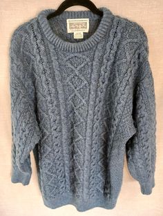 This is a Vintage Aran !00% Merino Wool Cable Knit Crewneck Pullover Sweater Sz M. Made on the Aran Island in Ireland it has been gently worn and is in like new condition. Measurements Length 32" Shoulders 26" Sleeves 23" Chest 48" Icelandic Wool Sweaters, Cableknit Sweater, Aran Sweater, Fisherman Sweater, Gray Sweater, Knit Crewneck, Oversized Sweater, Wool Sweaters, Grey Sweater