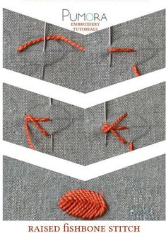 an orange piece of string is on the side of a gray fabric with white stripes