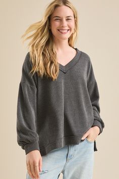 Diya Urban Ribbed Tunic in Charcoal | Altar'd State Spring V-neck Long Sleeve Loungewear Top, Spring Ribbed V-neck Sweater For Loungewear, Oversized V-neck Sweater For Loungewear, Cozy V-neck Top With Soft Texture, Cozy Ribbed V-neck Long Sleeve Sweater, Gray V-neck Sweater For Loungewear, Oversized V-neck Sweater With Soft Texture, Relaxed Fit Soft Knit V-neck Sweater For Layering, Casual V-neck Long Sleeve Top With Relaxed Fit