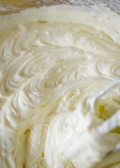 a mixing bowl filled with white batter