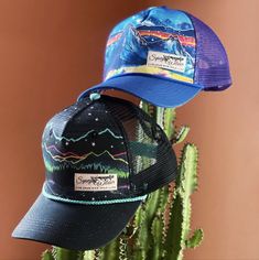 Feel the beat of your mountain heart. This lively pattern of jagged, brightly colored mountain and pine silhouettes takes you on a journey under a starry sky. Made from 100% recycled cotton and polyester mesh, this completely rad trucker is printed with our original Mountain Pulse design. Aqua snapback closure. Summer Outdoor Hat With Graphic Print, Multicolor Snapback Baseball Cap For Outdoor, Multicolor Adjustable Hat For Outdoor Activities, Multicolor Baseball Cap For Outdoor, Multicolor Outdoor Hat, One Size, Multicolor Outdoor Hat, One Size Fits Most, Multicolor Outdoor Hat, Multicolor Curved Brim Baseball Cap For Outdoor, Summer Hiking Hat With Flat Bill