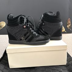 Size 7 Black Coach Shoes. Never Worn. Black Lace-up Wedge Sneakers, Trendy Black Wedge Sneakers With Round Toe, Black High Heel Wedge Sneakers For Casual Wear, Black Trendy Wedge Sneakers, Casual Black Wedge Heel Sneakers, Black Leather Wedge Sneakers, Black Wedge Sneakers With Laces, Black Wedge Heel Sneakers With Branded Insole, Black Synthetic Sneakers Medium Width